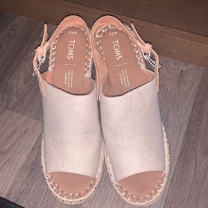 Brand new Toms wedges.